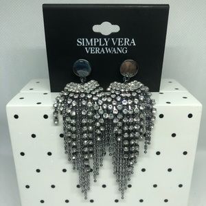 Dangling earrings by Vera Wang